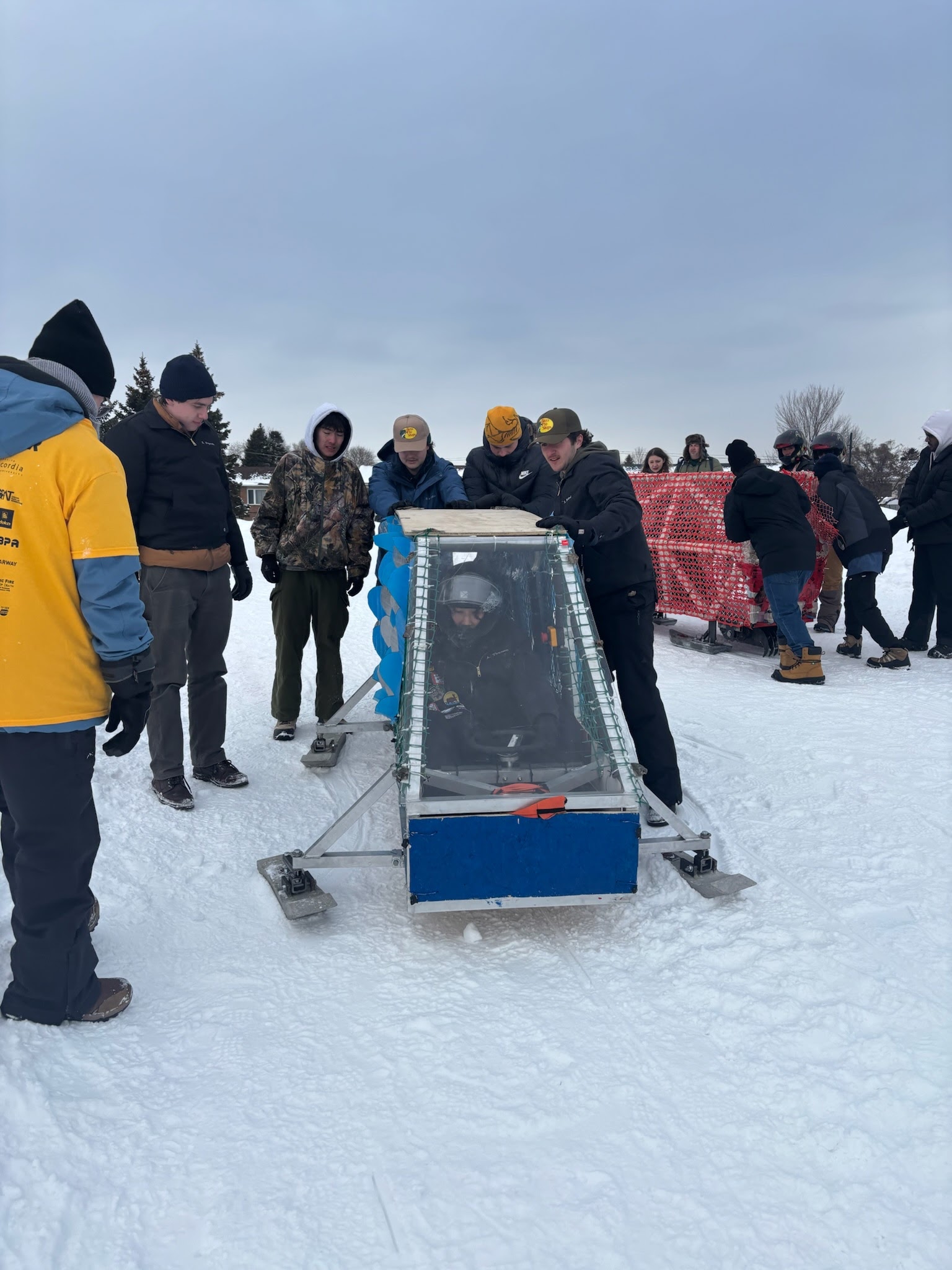 Team working on toboggan