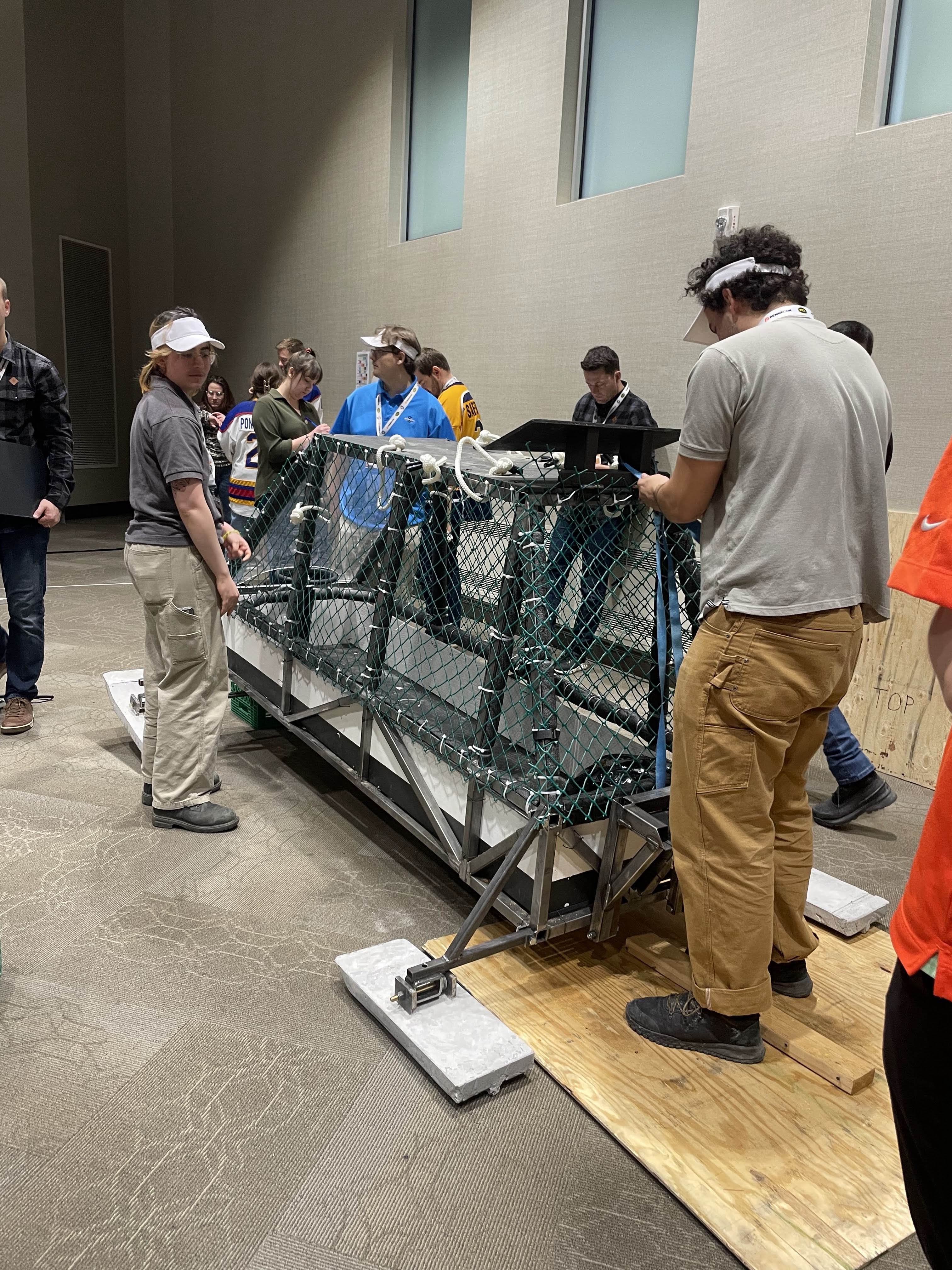 Team working on toboggan